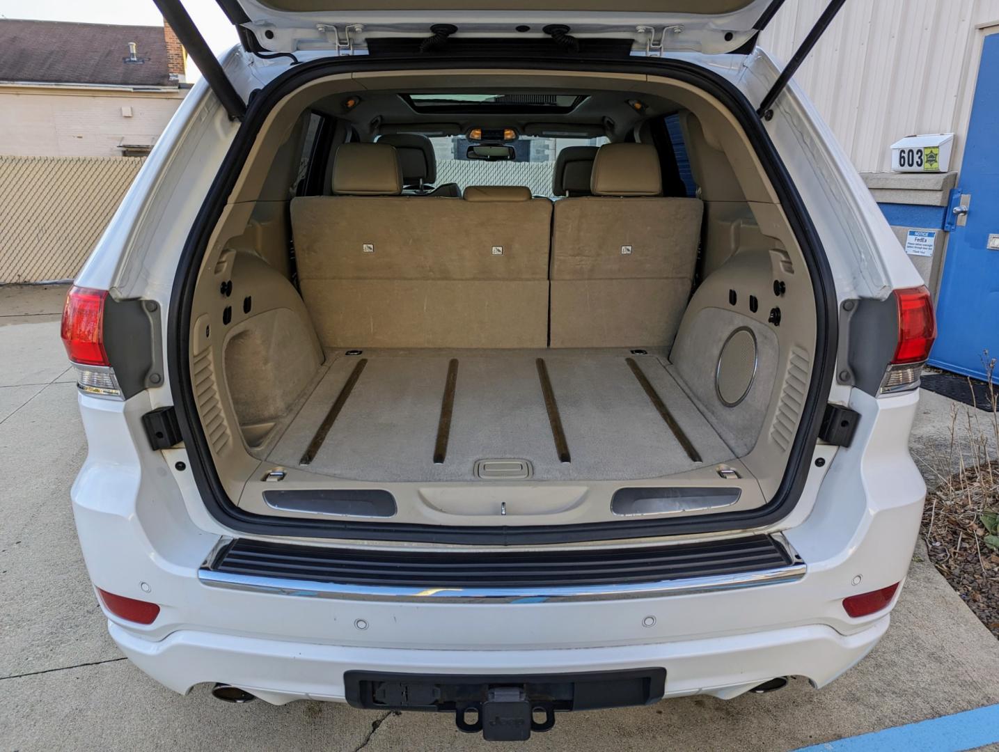 2014 White /Nepal Tan Jeep Grand Cherokee (1C4RJFCGXEC) with an 3.6L V6 DOHC 24V engine, Automatic transmission, located at 603 Amelia Street, Plymouth, MI, 48170, (734) 459-5520, 42.378841, -83.464546 - Vehicles shown by appointment - Please call ahead - 734-459-5520, text 734-658-4573 or contact us via our web site at: http://www.selectmotors.com for complete Inventory, Photos, Videos and FREE Carfax Reports. 2014 Jeep Grand Cherokee Overland, Bright White/Nepal Tan interior, 116K miles, all wh - Photo#7